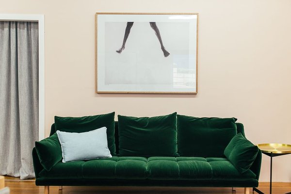 wall art size above sofa